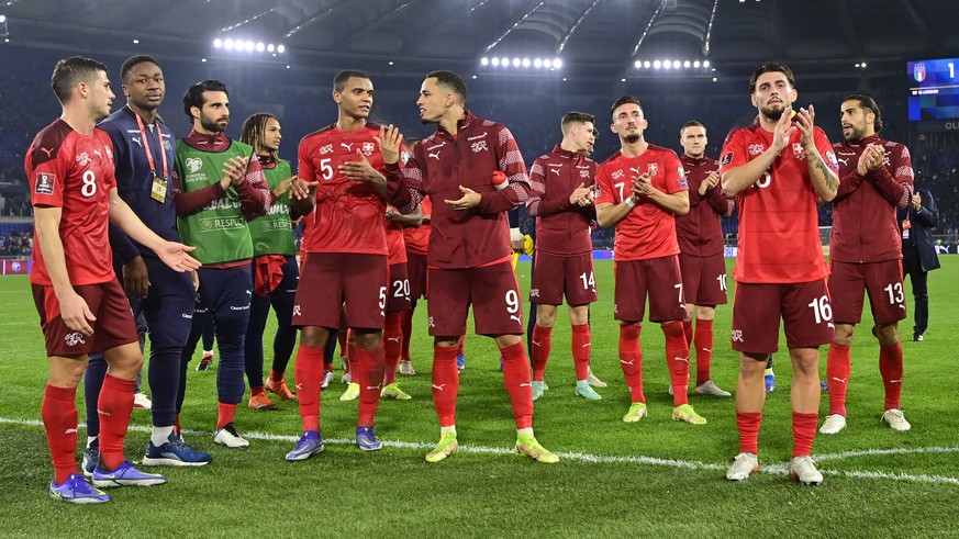 epa09579579 Switzerland&#039;s players cheer after the 2022 FIFA World Cup European Qualifying Group C match between Italy and Switzerland at the Stadio Olimpico in Rome, Italy, 12 November 2021. EPA/ ...