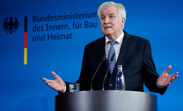 epa07031745 German Minister of Interior, Construction and Homeland Horst Seehofer speaks during a press conference, in Berlin, Germany, 19 September 2018. One day after a meeting of the party leaders  ...