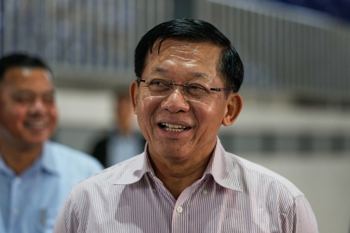 Myanmar military leader Senior Gen. Min Aung Hlaing visits a polling station during the final round of general election in Mandalay, central Myanmar, Sunday, Jan. 25, 2026. (AP Photo/Aung Shine Oo)