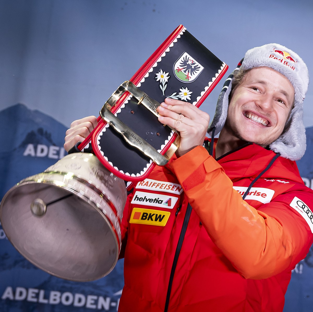 epa11061470 Winner Marco Odermatt of Switzerland, celebrates with a cowbell during the award ceremony of the men's giant slalom race at the FIS Alpine Skiing World Cup in Adelboden, Switzerland,  ...