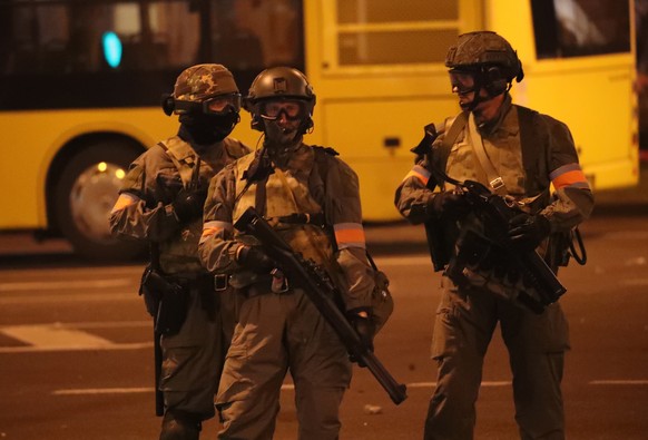 epa08596585 Riot police clear protesting people from an area in Minsk, Belarus, 10 August 2020. Long-time President of Belarus Alexander Lukashenko won the elections by a landslide with 80 percent of  ...