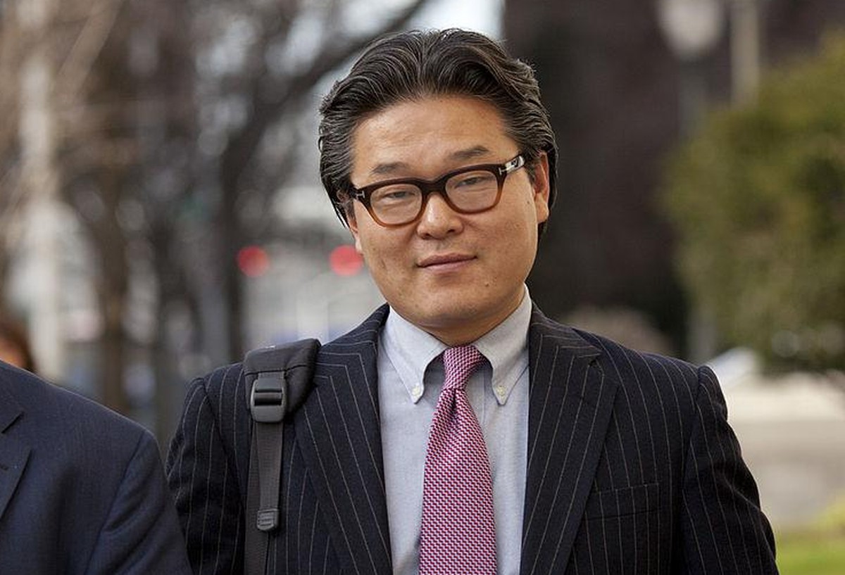 Bill Hwang, founder of of Tiger Asia Management LLC, right, exits federal court with his attorney Lawrence Lustberg in Newark, New Jersey, U.S., on Wednesday, Dec. 12, 2012. Tiger Asia Management LLC, ...