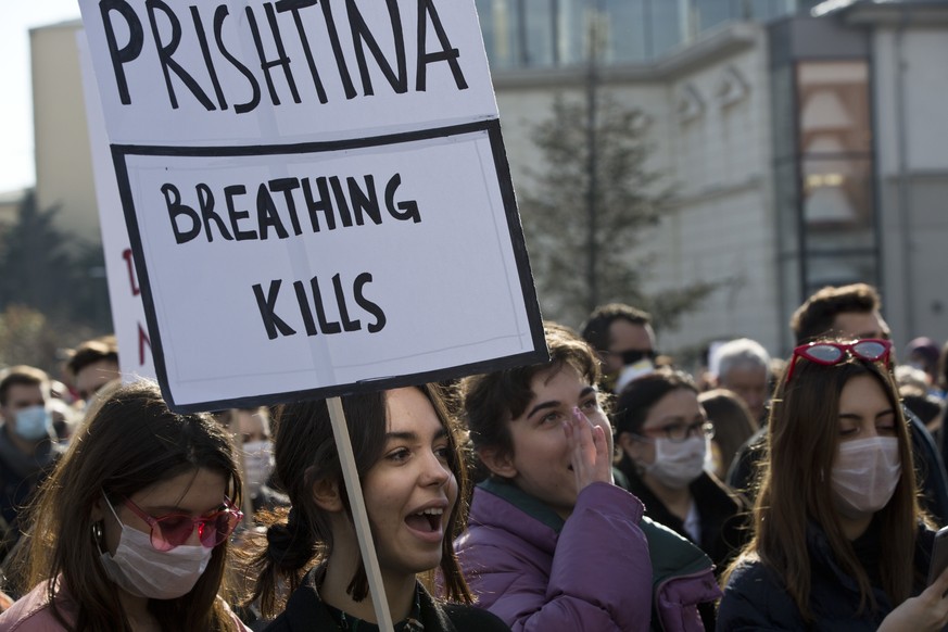 Kosovo citizens participate in a protest against heavy pollution in Kosovo capital Pristina on Wednesday, Jan. 31, 2018. Hundreds of people staged a protest Wednesday in Kosovo’s capital Pristina, urg ...