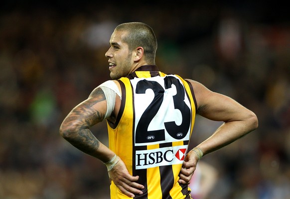 MELBOURNE, AUSTRALIA - MAY 01: Lance Franklin of the Hawks remarks to his opponent during the round 6 AFL match between the Essendon Bombers and the Hawthorn Hawks at Melbourne Cricket Ground on May 1 ...