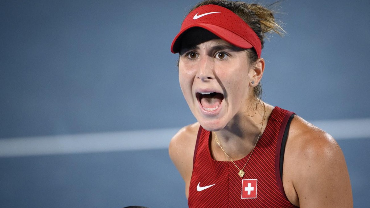 Belinda Bencic of Switzerland reacts during her games against Marketa Vondrousova of Czech Republic during the women's singles tennis gold final at the 2020 Tokyo Summer Olympics at the Ariake Co ...