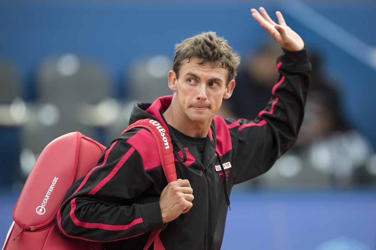 Henri Laaksonen of Switzerland reacts after loosing his game against Joao Sousa of Portugal during a second round game at the Swiss Open tennis tournament in Gstaad, Switzerland, Thursday, July 27, 20 ...