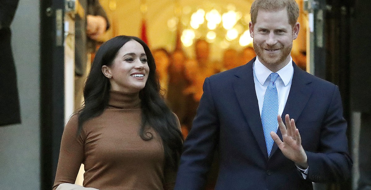 FILE - In this Jan. 7, 2020, file photo, Britain's Prince Harry and Meghan, Duchess of Sussex leave Canada House in London. Six months after detangling their work lives from the British royal fam ...