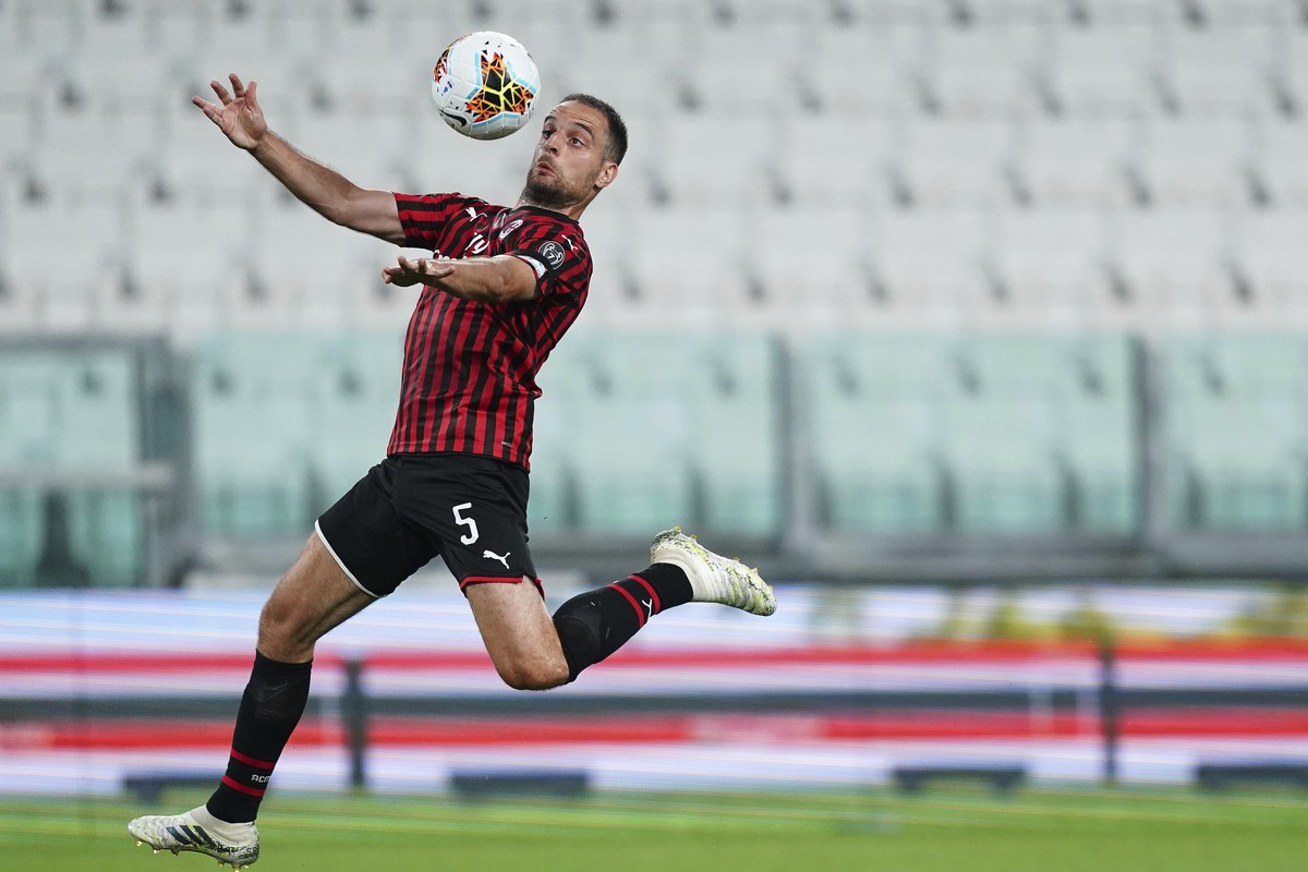 AC Milan's Giacomo Bonaventura goes for the ball during an Italian Cup second leg soccer match between Juventus and AC Milan at the Allianz stadium, in Turin, Italy, Friday, June 12, 2020. The ma ...