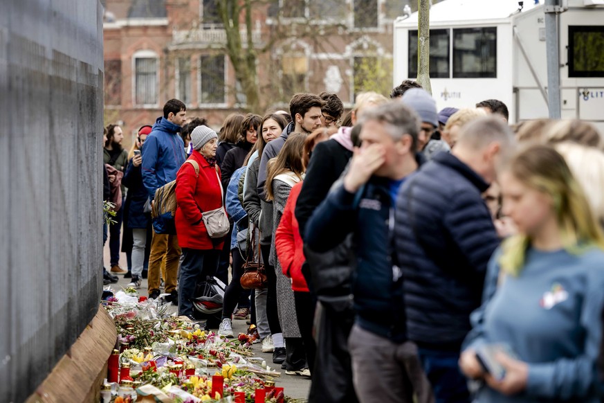 epa11225374 Russians wait in line to vote at the Russian embassy in The Hague, Netherlands, 17 March 2024. Russians living in the Netherlands vote in the Russian presidential elections, as Yulia Naval ...