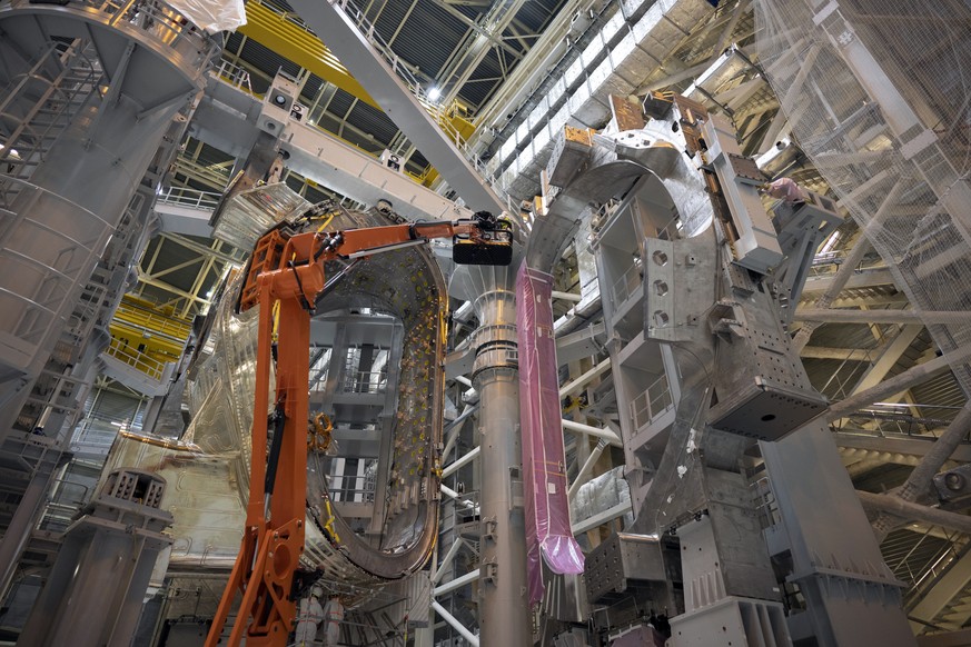 The heat blanket, left, and vacuum vessel components of the ITER machine are pictured at the Tokamak complex in Saint-Paul-Lez-Durance, France, Thursday, Sept. 9, 2021. Scientists at the International ...