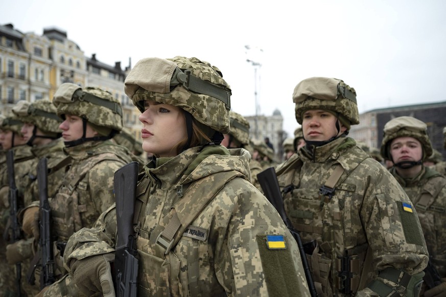 February 24, 2023, Kyiv, Kyiv Oblast, Ukraine: Ukrainian soldiers stand at attention during the 1st anniversary of the Russian invasion at Saint SophiaÃââ s Square, February 24, 2023 in Kyiv, Ukraine. ...
