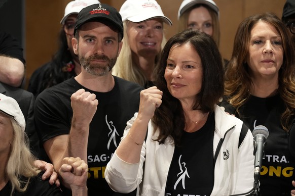 SAG-AFTRA president Fran Drescher, center, Ben Whitehair, left, and Joely Fisher attend a press conference announcing a strike by The Screen Actors Guild-American Federation of Television and Radio Ar ...