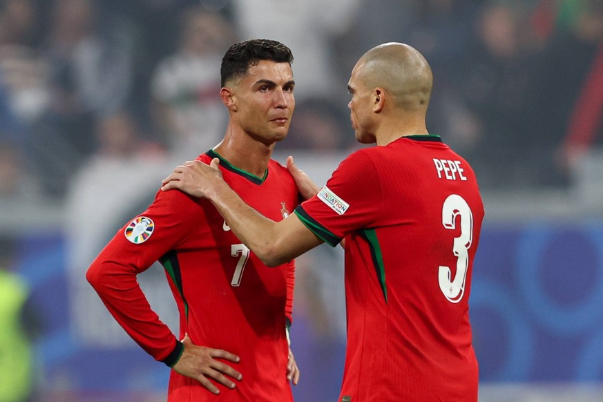 July 1, 2024, Frankfurt, Germany: Cristiano Ronaldo of Portuga L and Kepler Laveran Lima Ferreira of Portugal R seen during the UEFA EURO, EM, Europameisterschaft,Fussball 2024 match between Portugal  ...