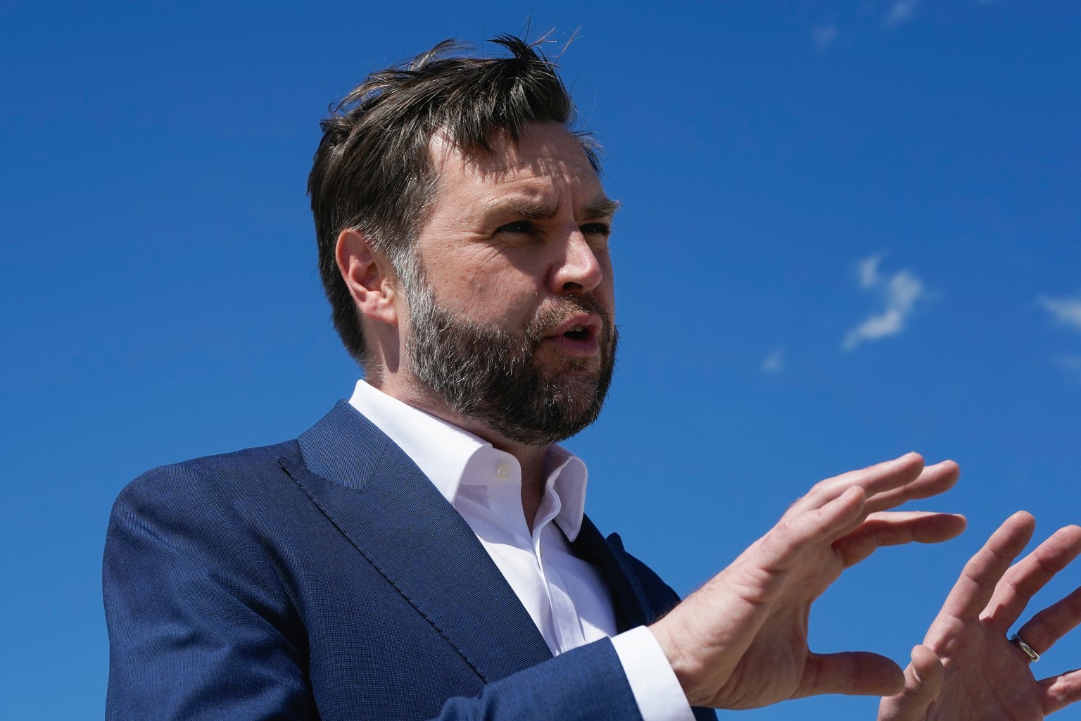 Vice President JD Vance speaks to reporters at Joint Base Andrews, Md., Saturday, June 20, 2026, en route to Switzerland. (Elizabeth Frantz/Pool Photo via AP)
Vance