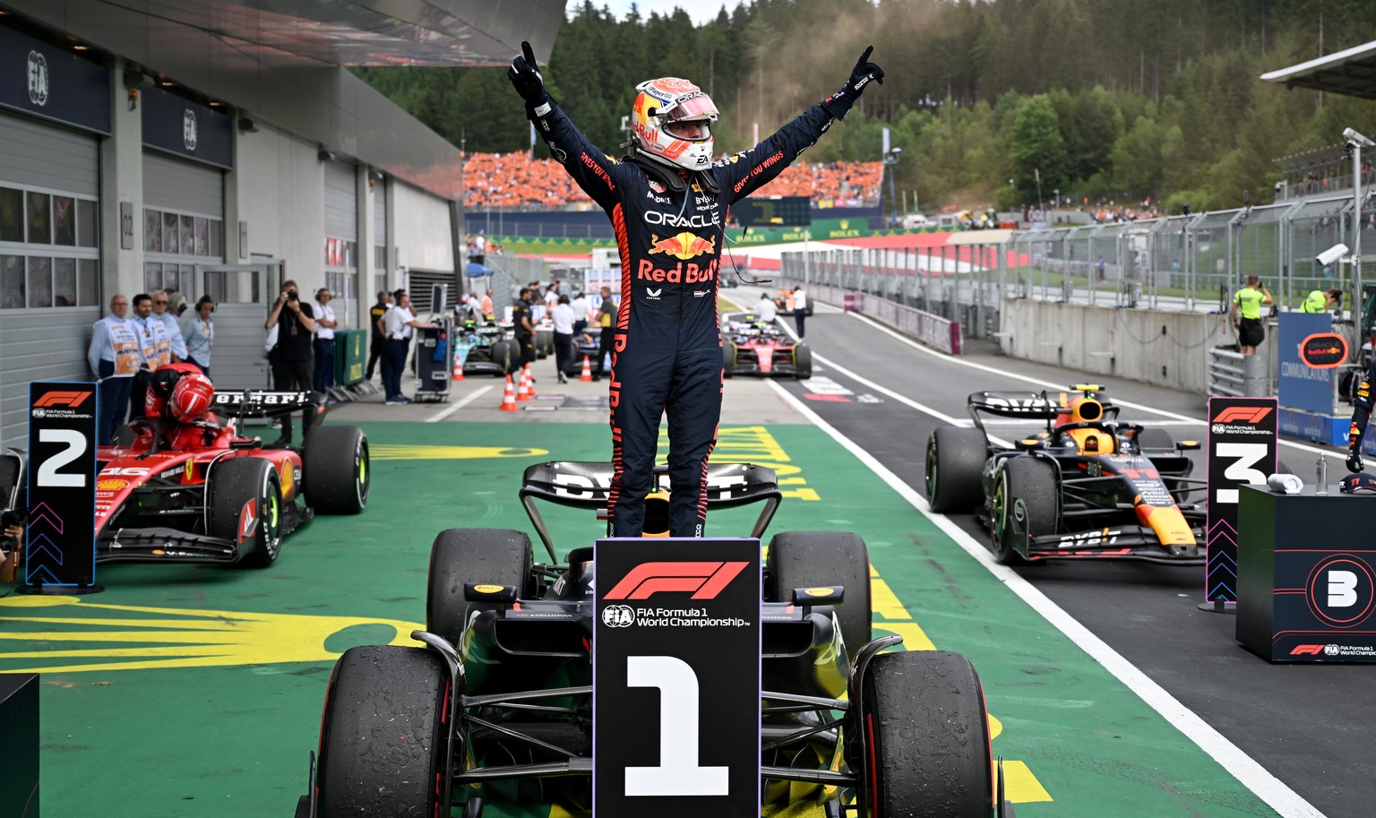 epa10722556 Dutch Formula One driver Max Verstappen of Red Bull Racing celebrates in the Parc ferme after winning after winning the Formula 1 Austrian Grand Prix at the Red Bull Ring race track in Spi ...