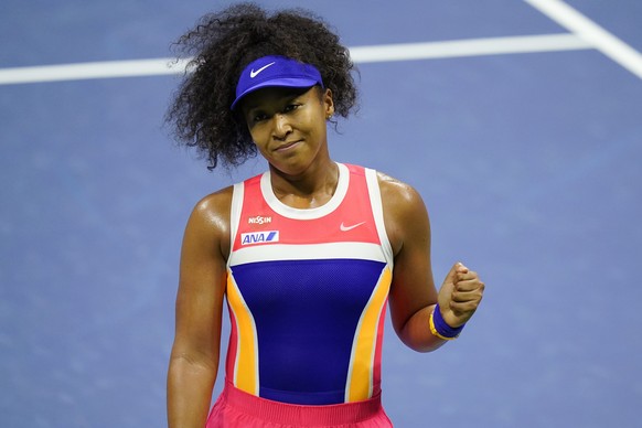 Naomi Osaka, of Japan, celebrates after winning a match against Anett Kontaveit, of Estonia, during the fourth round of the US Open tennis championships, Monday, Sept. 7, 2020, in New York. (AP Photo/ ...