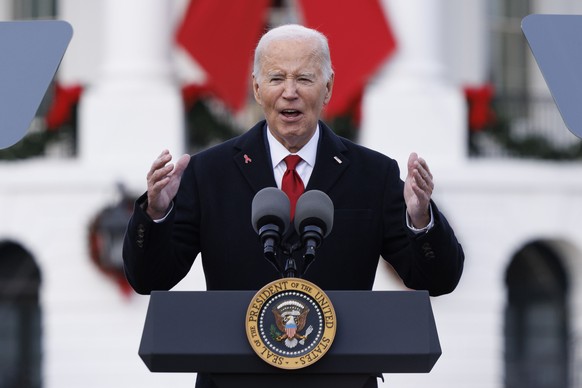 epa11752564 US President Joe Biden gives remarks during an event to commemorate World AIDS Day on the South Lawn of the White House in Washington, DC, US, 01 December 2024. Biden is unveiling the AIDS ...