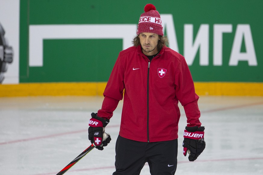 Patrick Fischer, head coach of Switzerland national ice hockey team, looks his players, during a Switzerland team training session at the IIHF 2021 World Championship, at the Olympic Sports Center, in ...