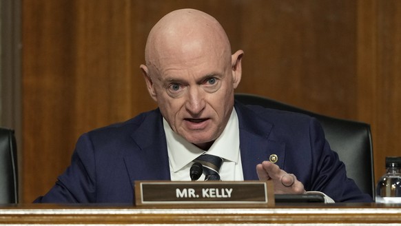 Sen. Mark Kelly, D-Ariz., speaks during the Senate Armed Services Committee confirmation hearing for Pete Hegseth, President-elect Donald Trump&#039;s choice to be Defense secretary, at the Capitol in ...
