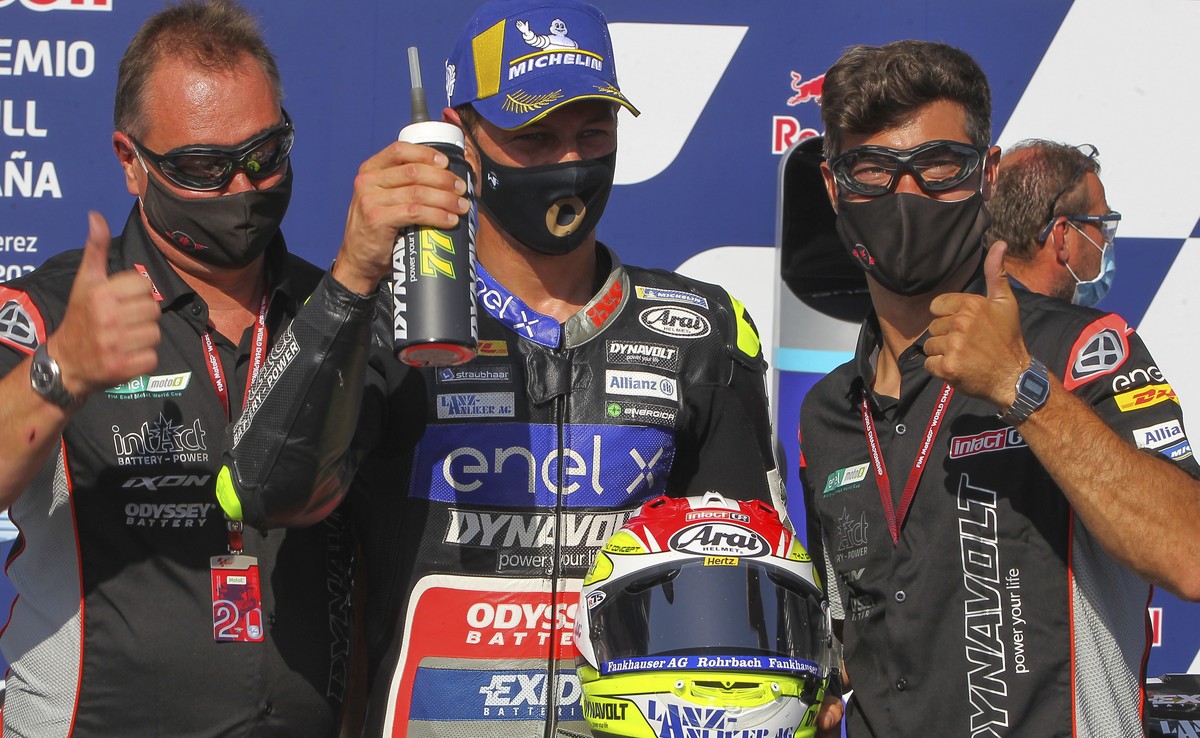 Swiss driver Dominique Aegerter, center, celebrates his third position after the MotoE race during the Spanish Motorcycle Grand Prix race at the Angel Nieto racetrack in Jerez de la Frontera, Spain, S ...