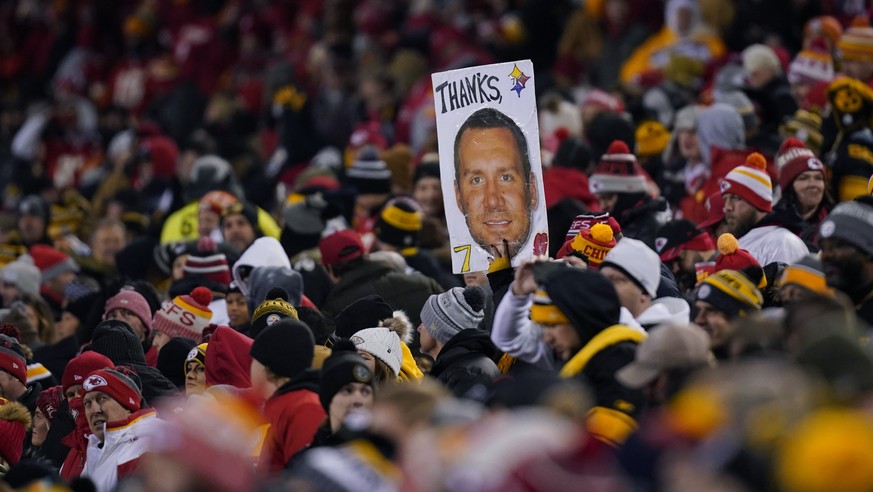 A fan holds a poster of Pittsburgh Steelers quarterback Ben Roethlisberger during the first half of an NFL wild-card playoff football game between the Kansas City Chiefs and the Pittsburgh Steelers, S ...