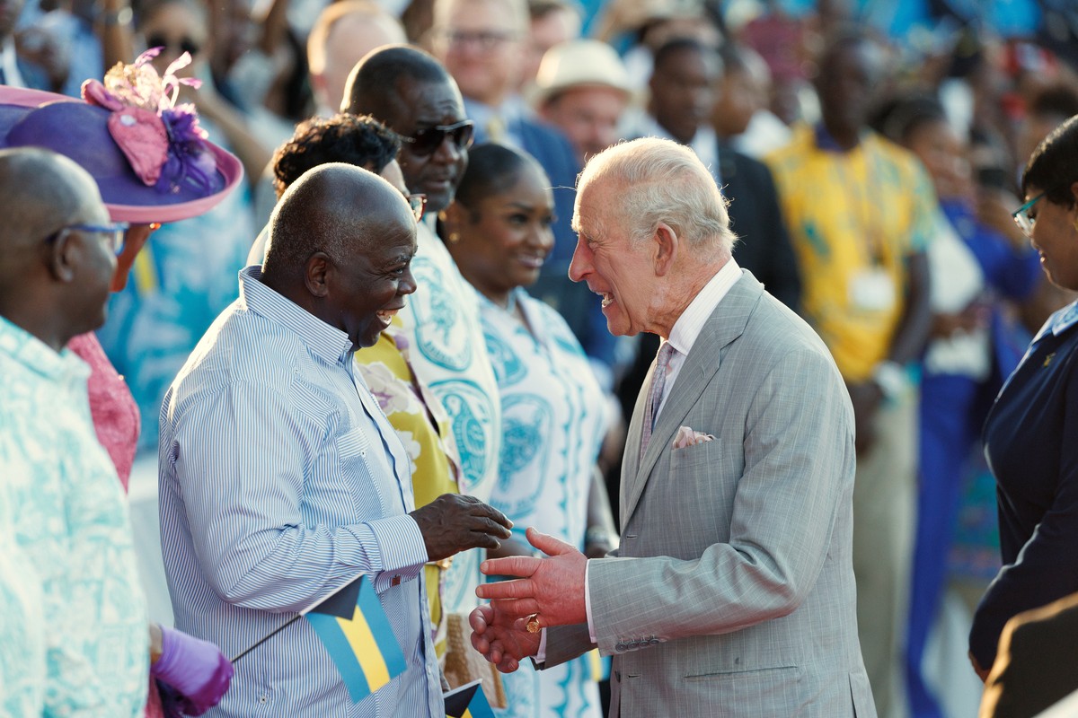 Britain's King Charles III greets Bahamian Prime Minister Philip Davis at The Future Bahamas Youth Rally and Exhibition at Clifford Park in Nassau, Bahamas, Tuesday, Oct. 27, 2026. (AP Photo/Tim  ...