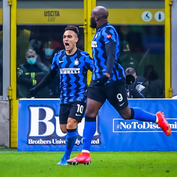 February 14, 2021, Milan, Italy: Milan, Italy, Giuseppe Meazza stadium, February 14, 2021, Lautaro Martinez of FC Internazionale celebrates after scoring a goal with Romelu Lukaku of FC Internazionale ...