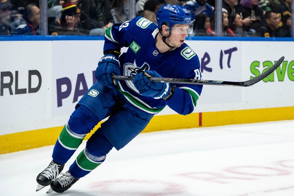 Vancouver Canucks' Marco Rossi (93) skates upice during the second period of an NHL hockey game against the San Jose Sharks in Vancouver, British Columbia, Saturday, Dec. 27, 2025. (Ethan Cairns/ ...