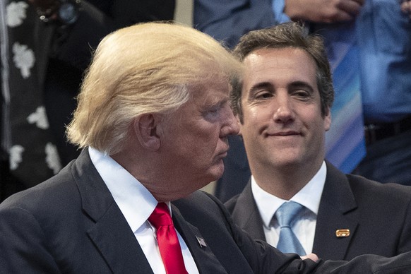 FILE- Republican presidential candidate Donald Trump, left, and attorney Michael Cohen, right, during a visit to the Pastors Leadership Conference at New Spirit Revival Center, Sept. 21, 2016, in Clev ...