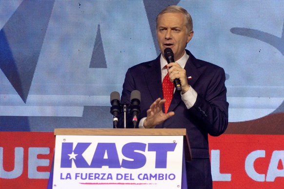 epa12530372 Jose Antonio Kast, the presidential candidate for the Republican and Social Christian Party of Chile, speaks after learning the election results in Santiago, Chile, 16 November 2025. Kast  ...