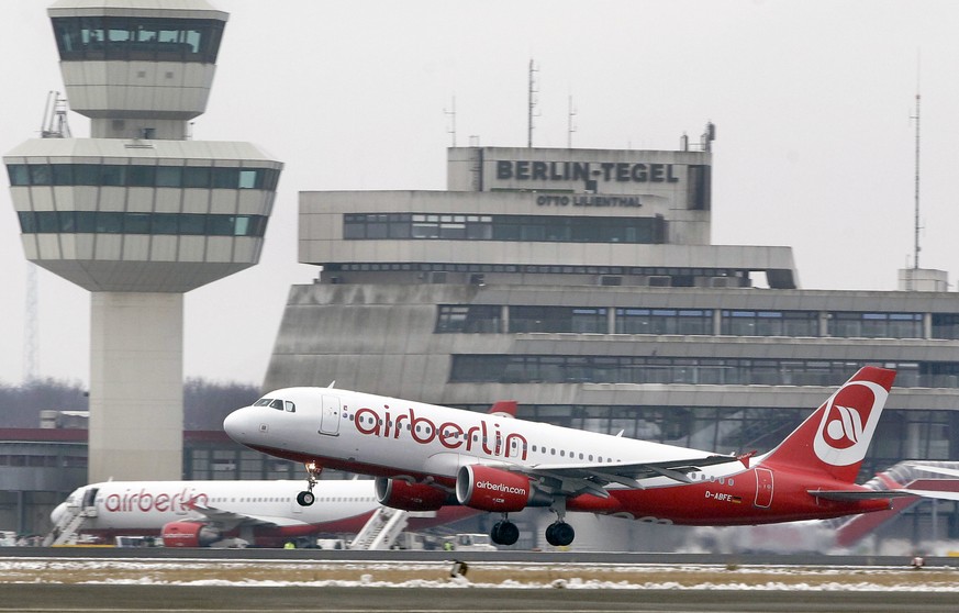 FILE - In this Jan. 20, 2013 file photo an airplane of the airline &#039;airberlin&#039; lifts off at the airport Tegel in Berlin. Plans to replace Berlin’s three small airports with a shiny new one h ...