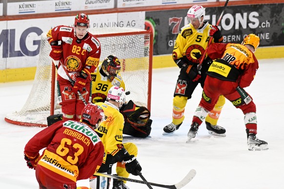 The Tigers' Dario Rohrbach, leadoff, defeated Burns Goalie Adam Redburn and Patrik Nemeth during a National League ice hockey playoff game between the SCL Tigers and SC Burns, on Saturday,...