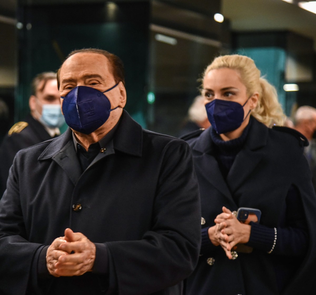 epa09602831 Former Italian Prime Minister and leader of Italian party "Forza Italia" (FI), Silvio Berlusconi, with his girlfriend Italian deputy Marta Fascina pay homage to the funeral home  ...