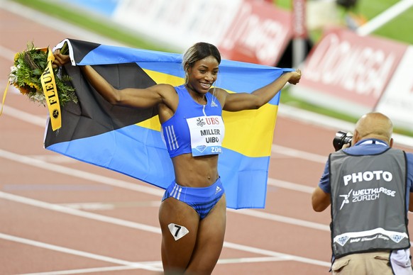 epa06160715 Shaunae Miller-Uibo (L) of the Bahamas celebrates after winning the women&#039;s 200m race during the Weltklasse IAAF Diamond League international athletics meeting in the Letzigrund stadi ...