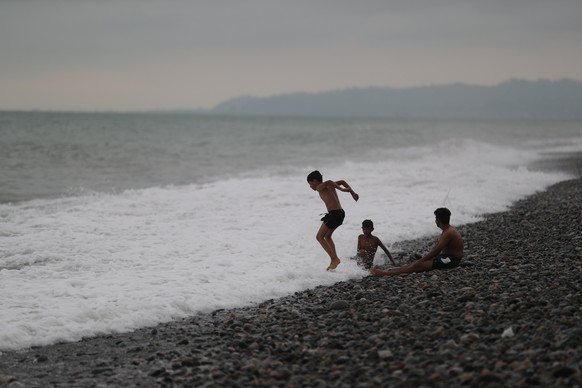 epa07781002 People spend time on the beach in Batumi, Georgia, 19 August 2019. Batumi is a seaside resort on the Black Sea coast in southwest Georgia. EPA/ZURAB KURTSIKIDZE