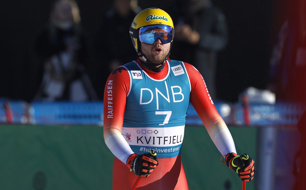 Switzerland's Niels Hintermann celebrates at the finish area of an alpine ski, men's World Cup downhill race, in Kvitfjell, Norway, Saturday, Feb. 17, 2024. (AP Photo/Alessandro Trovati)