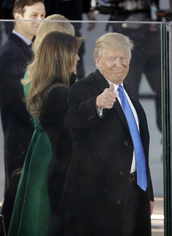 President-elect Donald Trump and his wife Melania Trump appear at a pre-Inaugural &quot;Make America Great Again! Welcome Celebration&quot; at the Lincoln Memorial in Washington, Thursday, Jan. 19, 20 ...