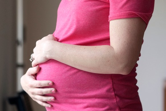 FILE - A pregnant woman stands for a portrait in Dallas, May 18, 2023. (AP Photo/LM Otero, File)
Be Well-Older Moms