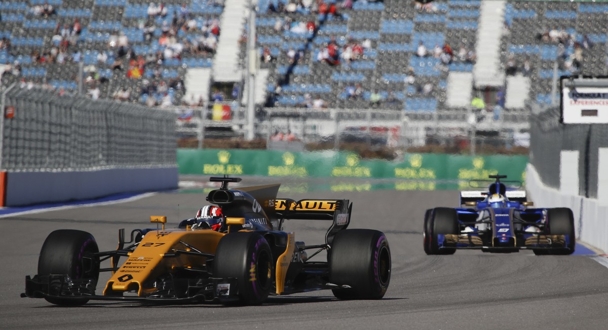 Renault driver Nico Hulkenberg of Germany leads Sauber driver Marcus Ericsson of Sweden during the second free practice session ahead the Formula One Russian Grand Prix at the 'Sochi Autodrom ...