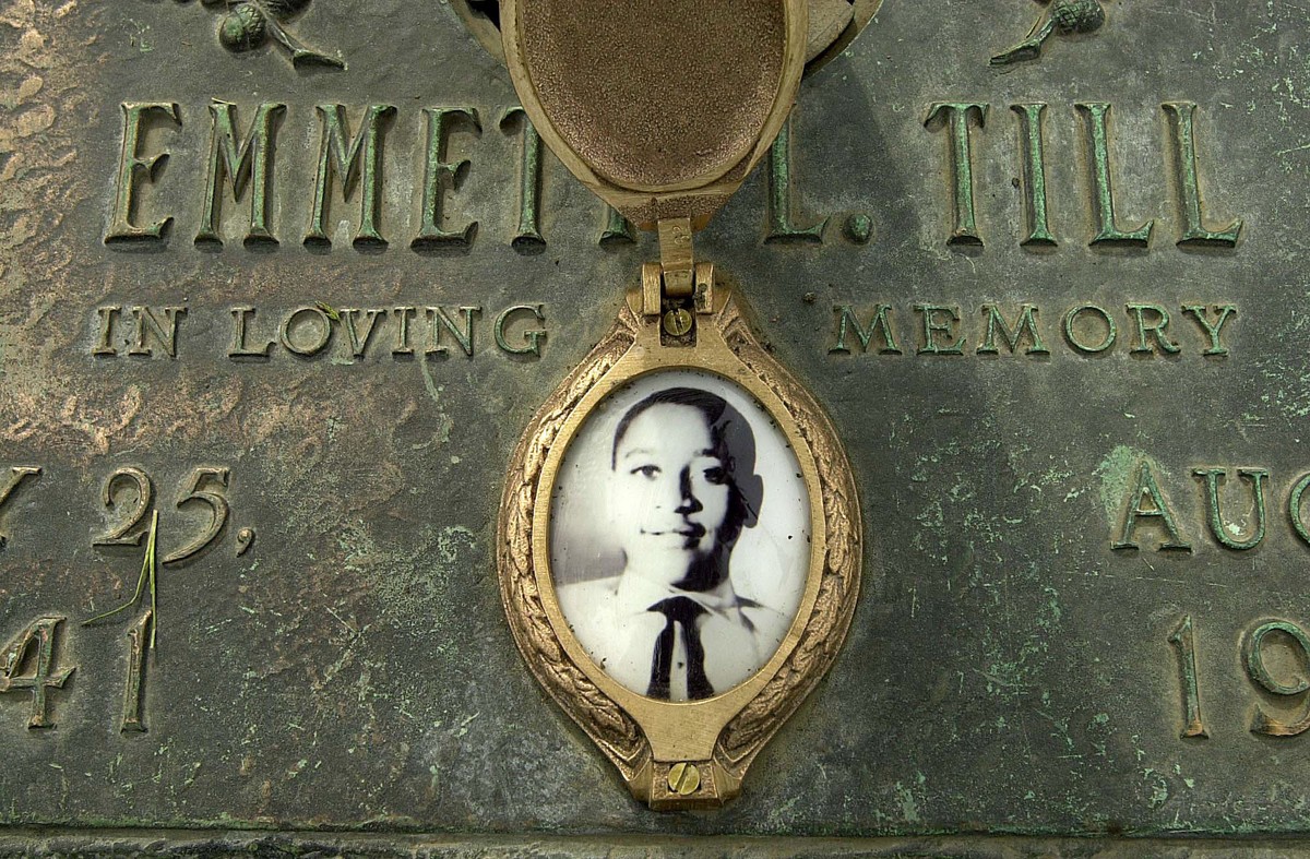 FILE - In this May 4, 2005 file photo, Emmett Till's photo is seen on his grave marker in Alsip, Ill. Legislation that would make lynching a federal hate crime in the U.S. is expected to be signe ...