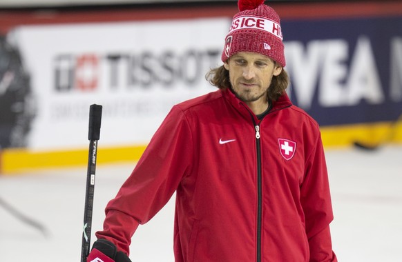 Patrick Fischer, head coach of Switzerland national ice hockey team, looks his players during a training session, at the IIHF 2021 World Championship quarter final game between Switzerland and Germany ...