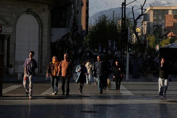 People cross an intersection in downtown Tehran, Iran, Monday, March 30, 2026. (AP Photo/Vahid Salemi)
Iran Daily Life