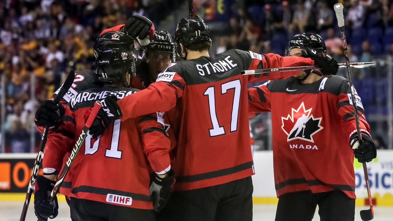 epa07581278 Players of Canada celebrate goal during the IIHF World Championship group A ice hockey match between Canada and Germany at the Steel Arena in Kosice, Slovakia, 18 May 2019. EPA/MARTIN DIVI ...