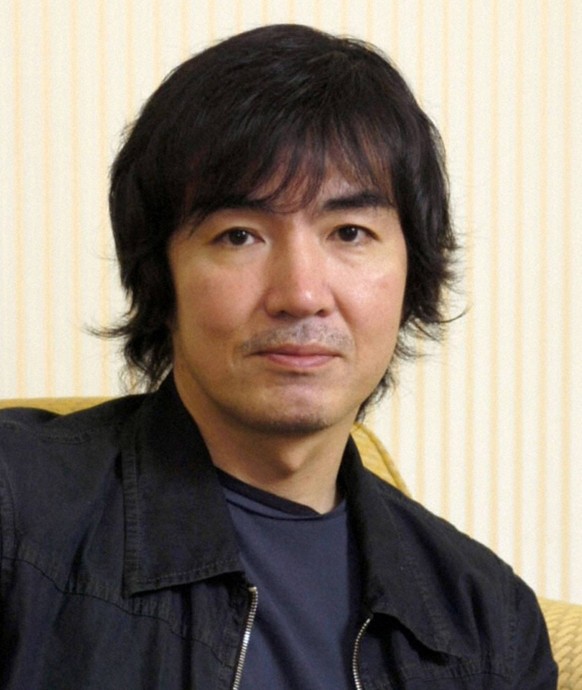 TOKYO, Japan - File photo shows Japanese novelist Keigo Higashino. Mystery Writers of America on Jan. 19, 2012, announced its nominees for the 2012 Edgar Allan Poe Awards, including The Devotion of Su ...