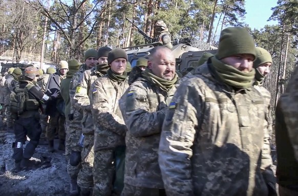 epa09856172 A handout still image taken from handout video made available by the Russian Defence Ministry's press service claims to show Ukrainian servicemen that were allegedly captured in a protected buried command post of the Ukrainian armed forces near Kiev (Kyiv), Ukraine, 28 March 2022. On 24 February Russian troops had entered Ukrainian territory in what the Russian president declared a 'special military operation', resulting in fighting and destruction in the country, a huge flow of refugees, and multiple sanctions against Russia.  EPA/RUSSIAN DEFENCE MINISTRY PRESS SERVICE HANDOUT  HANDOUT EDITORIAL USE ONLY/NO SALES