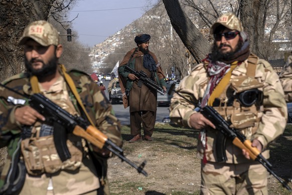 Taliban fighters stand guard in Kabul, Afghanistan, Monday, Dec. 26, 2022. Recent Taliban rulings on Afghan women include bans on university education and working for NGOs, sparking protests in major  ...