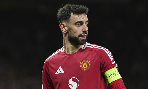 Manchester United&#039;s Bruno Fernandes looks on during the Europa League quarter final second leg soccer match between Manchester United and Olympique Lyon in Manchester, Britain, Thursday, April 17 ...