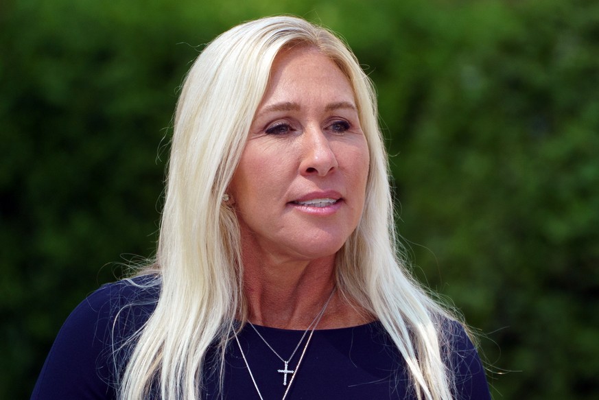 epa12068076 Republican Representative from Georgia Marjorie Taylor Greene attends the National Day of Prayer Event in the Rose Garden of the White House in Washington, DC, USA, 01 May 2025. EPA/WILL O ...