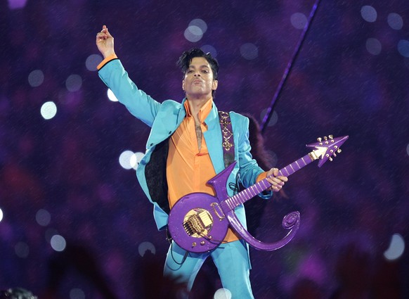 FILE - In this Feb. 4, 2007 file photo, Prince performs during the halftime show at the Super Bowl XLI football game at Dolphin Stadium in Miami. Widely acclaimed as one of the most inventive and infl ...