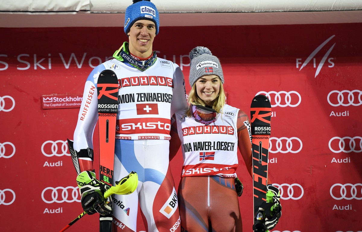 epa06486521 Ramon Zenhaeusern (L) of Switzerland and Norway's Nina Haver Loeseth pose on the podium after the FIS Alpine Skiing World Cup parallel slalom city event in Stockholm, Sweden, 30 Janua ...